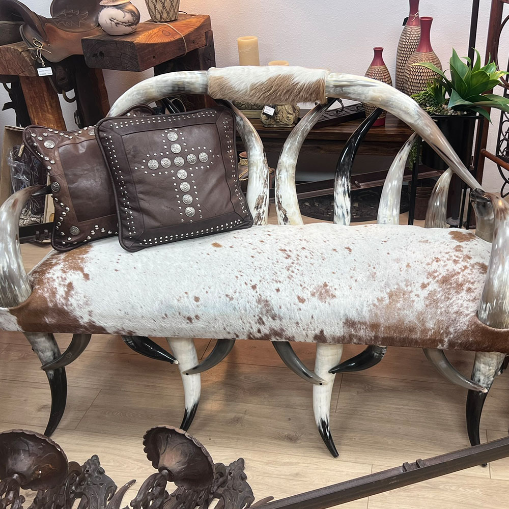 cow hide and bull horns bench